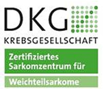 Logo der DKG Krebsgesellschaft, zertifiziertes Sarkomzentrum für Weichteilsarkome, mit grünem Punktmuster.
